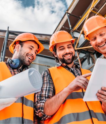 bottom-view-of-group-of-builders-with-blueprint-an-2021-08-29-22-35-48-utc-1.jpg